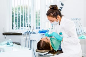 Patient getting dental work done.