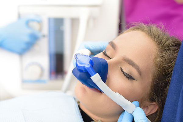 patient at the dentist getting dental sedation